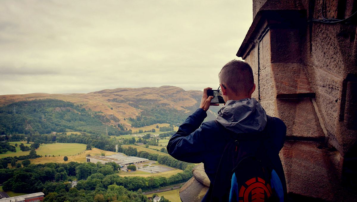 ISSFT student looking at the landscape from the top of the Wallace Monument